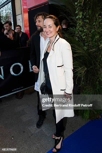 Harumi Klossowska De Rola and her husband Benoit Peverelli attend the Paris premiere of "Noah" directed by Darren Aronofsky at Cinema Gaumont...