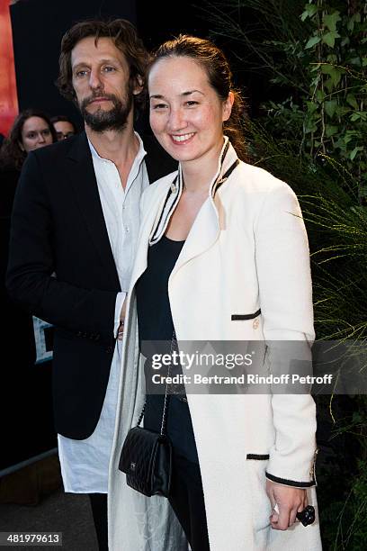 Harumi Klossowska De Rola and her husband Benoit Peverelli attend the Paris premiere of "Noah" directed by Darren Aronofsky at Cinema Gaumont...