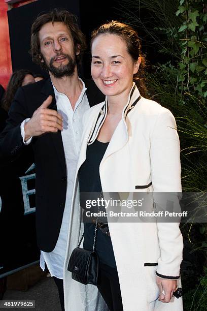 Harumi Klossowska De Rola and her husband Benoit Peverelli attend the Paris premiere of "Noah" directed by Darren Aronofsky at Cinema Gaumont...