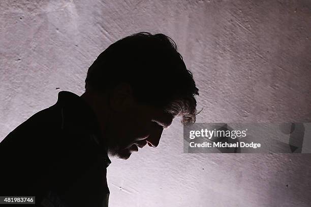 Magpies assistant coach Robert Harvey walk out or warm up during the round 17 AFL match between the Western Bulldogs and the Collingwood Magpies at...