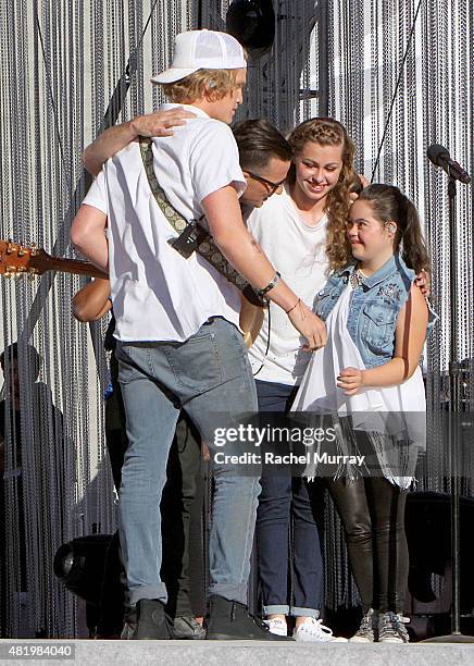 Cody Simpson, Marc Roberge of O.A.R, Bree Bogucki, and Madison Tevlin open the 2015 Los Angeles Special Olympics World Games by performing the...