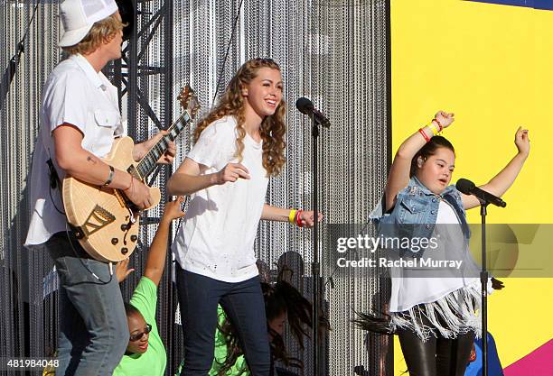 Cody Simpson, Bree Bogucki, and Madison Tevlin open the 2015 Los Angeles Special Olympics World Games by performing the Coca-Cola Unified song "Reach...