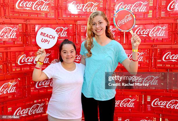 Madison Tevlin and Bree Bogucki arrive to open the 2015 Los Angeles Special Olympics World Games by performing the Coca-Cola Unified song "Reach Up"...