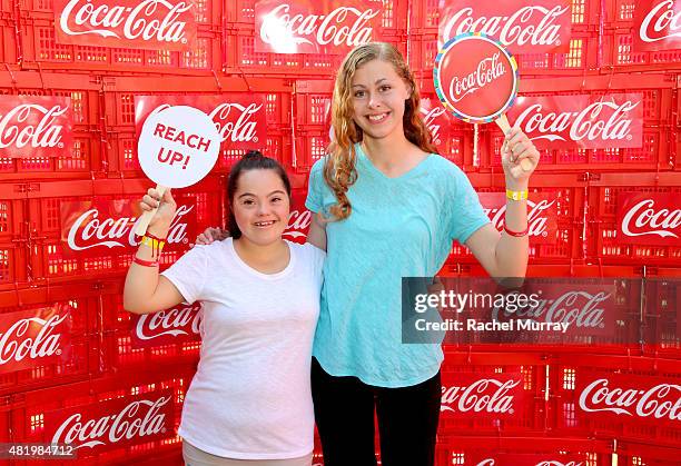 Madison Tevlin and Bree Bogucki arrive to open the 2015 Los Angeles Special Olympics World Games by performing the Coca-Cola Unified song "Reach Up"...