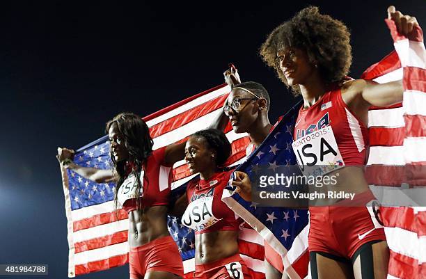 Shakima Wimbley, Kyra Jefferson, Shamier Little and Kendall Baisden of the USA celebrate winning Gold in the Women's 4x400m Final during Day 15 of...