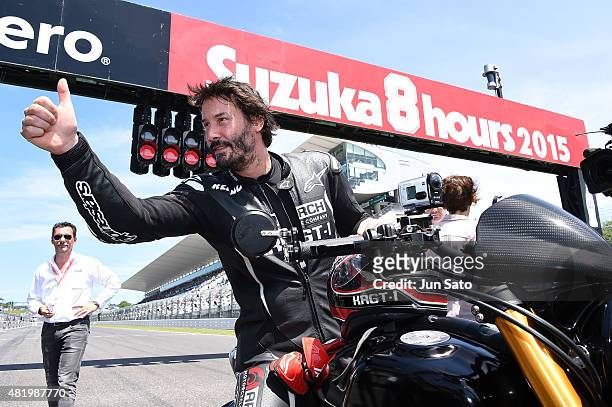 Keanu Reeves is seen during the opening ceremony of the Suzuka 8 Hours at the Suzuka Circuit on July 26, 2015 in Suzuka, Japan.