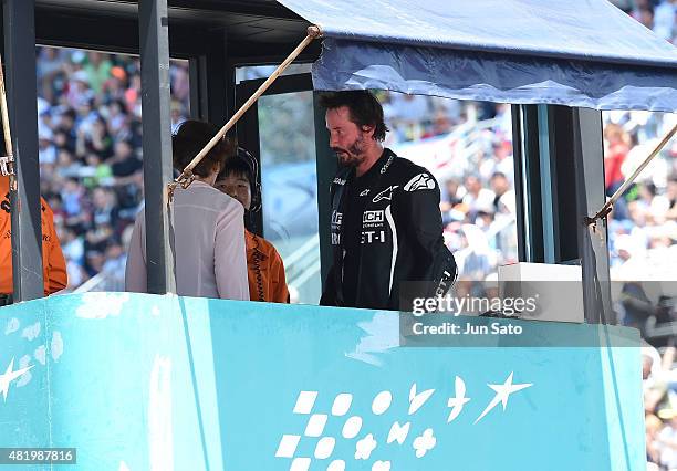 Keanu Reeves is seen during the opening ceremony of the Suzuka 8 Hours at the Suzuka Circuit on July 26, 2015 in Suzuka, Japan.