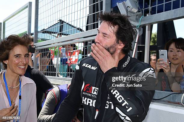 Keanu Reeves is seen during the opening ceremony of the Suzuka 8 Hours at the Suzuka Circuit on July 26, 2015 in Suzuka, Japan.