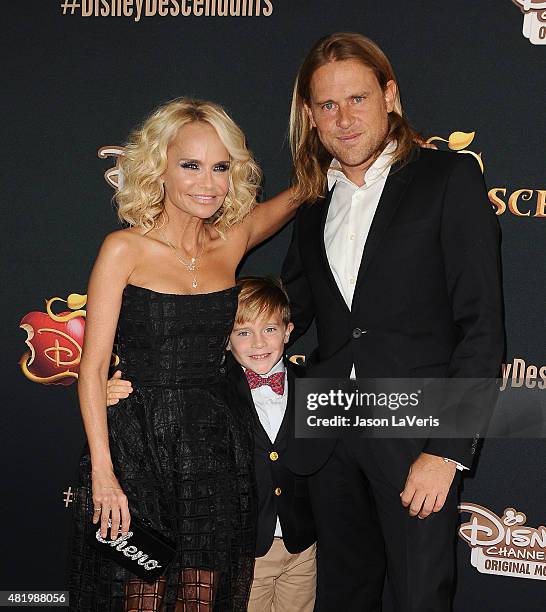 Kristin Chenoweth, Roman Pruett and Andrew Pruett attend the premiere of "Descendants" at Walt Disney Studios Main Theater on July 24, 2015 in...