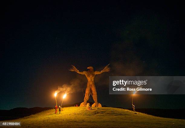 The burning of the Wickerman seen at midnight on the last day of the Wickerman festival at Dundrennan on July 25, 2015 in Dumfries, Scotland.