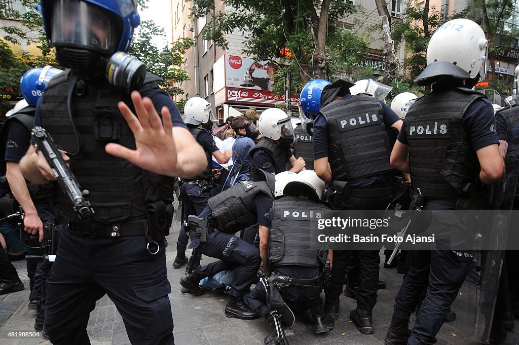 Demonstrators detained by Turkish police during a protest...