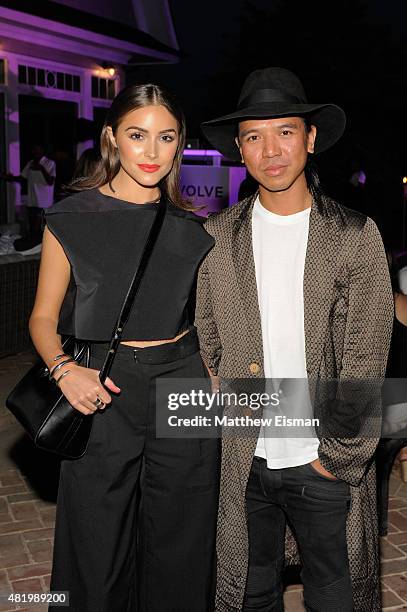 Olivia Culpo and Michael Mente attend The REVOLVE Hamptons House on July 25, 2015 in Sagaponack, New York.