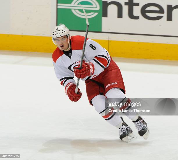 Andrei Loktionov of the Carolina Hurricanes follows the play up the ice during second period action against the Winnipeg Jets at the MTS Centre on...