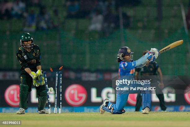 Punam Raut of India gets bowled out by Sania Khan of Pakistan during the ICC Women's World Twenty20 Playoff 2 match between Pakistan Women and India...