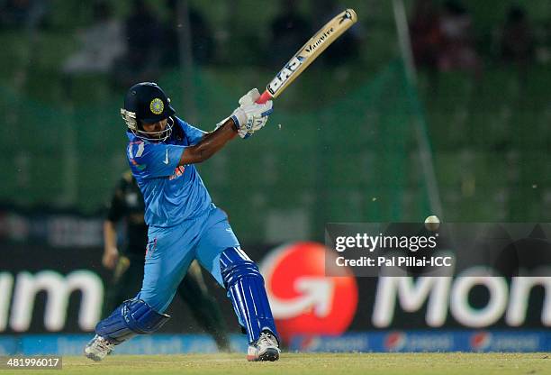 Shikha Pandey of India bats during the ICC Women's World Twenty20 Playoff 2 match between Pakistan Women and India Women played at Sylhet...