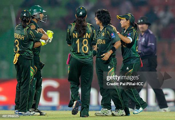 Sania Khan of Pakistan celebrates the wicket of Punam Raut of India during the ICC Women's World Twenty20 Playoff 2 match between Pakistan Women and...