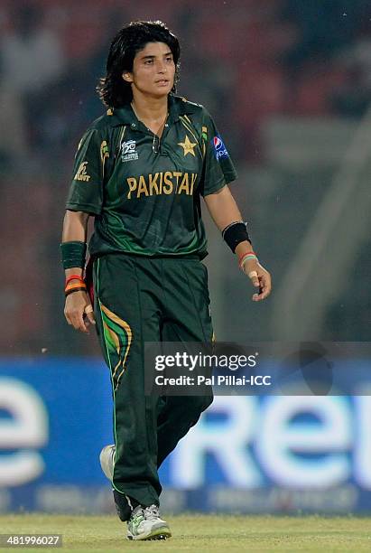 Sania Khan of Pakistan walks back to bowl during the ICC Women's World Twenty20 Playoff 2 match between Pakistan Women and India Women played at...