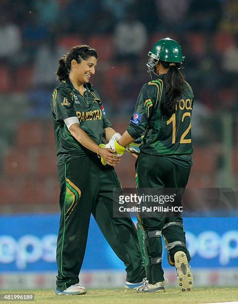 Asmavia Iqbal of Pakistan celebrates the wicket of Soniya Dabir of India during the ICC Women's World Twenty20 Playoff 2 match between Pakistan Women...