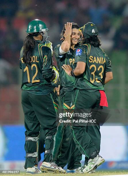 Asmavia Iqbal of Pakistan celebrates the wicket of Soniya Dabir of India during the ICC Women's World Twenty20 Playoff 2 match between Pakistan Women...