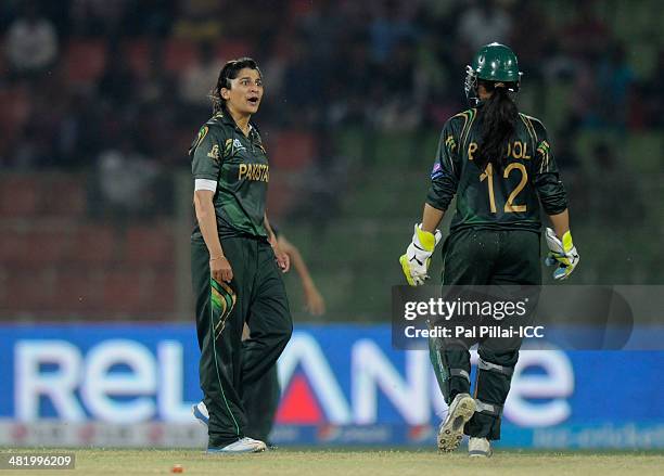 Asmavia Iqbal of Pakistan celebrates the wicket of Mithali Raj captain of India during the ICC Women's World Twenty20 Playoff 2 match between...