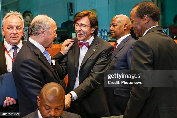 France's Laurent Fabius, Minister of Foreign Affairs and Belgium Prime Minister Elio Di Rupo attend the first day of the summit of European Union and...