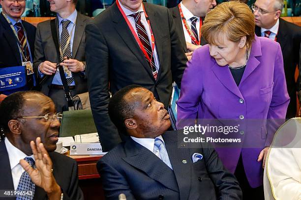 Congolese President Denis Sassou Nguesso and German Chancellor Angela Merkel attend the first day of the summit of European Union and African heads...