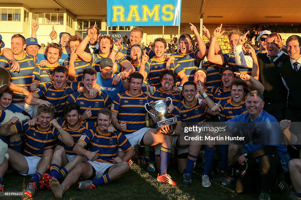 Lincoln Rfc Lincoln University team mates celebrate with the Hawkins Trophy after ...