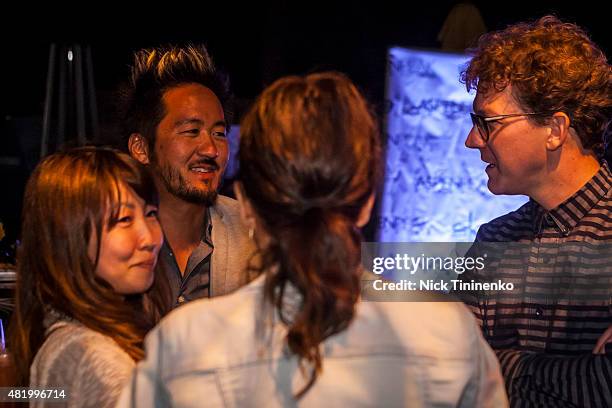 Kishi Bashi and his wife talks with Alex Brose at In the Mix: Kishi Bashi After-Party at The Sky Hotel on July 25, 2015 in Aspen, Colorado.