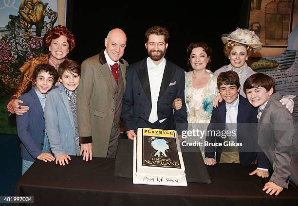 Anthony Warlow, Matthew Morrison and Laura Michelle Kelly pose with the cast backstage celebrating "Finding Neverland" on Broadway's 150th...