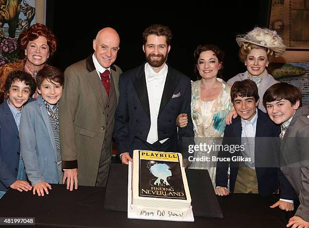 Anthony Warlow, Matthew Morrison and Laura Michelle Kelly pose with the cast backstage celebrating "Finding Neverland" on Broadway's 150th...