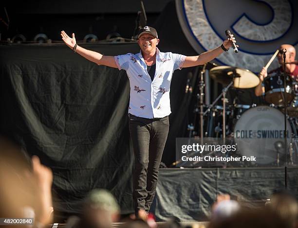 Cole Swindell performs during Kenny Chesney's The Big Revival Tour & Jason Aldean's Burn It Down 2015 at Rose Bowl on July 25, 2015 in Pasadena,...