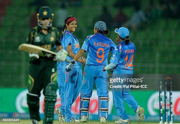 Subhlakshmi Sharma of India celebrates the wicket of Bismah Maroof of Pakistan during the ICC Women's World Twenty20 Playoff 2 match between Pakistan...