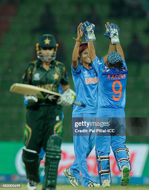 Subhlakshmi Sharma of India celebrates the wicket of Bismah Maroof of Pakistan during the ICC Women's World Twenty20 Playoff 2 match between Pakistan...