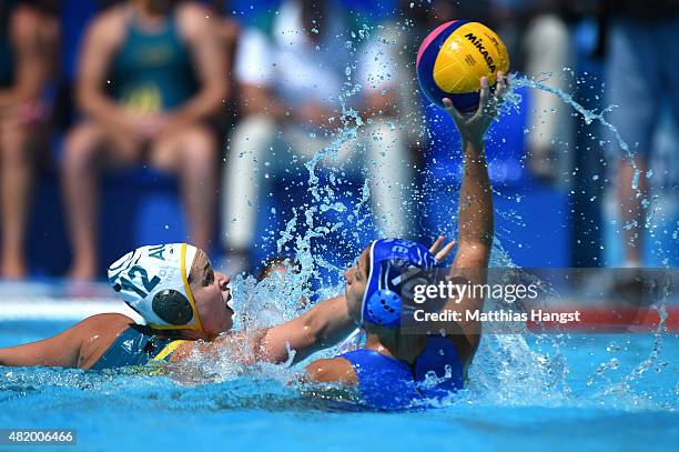 Nicola Zagame of Australia challenges Triantafyllia Manolioudaki of Greece during the Women's Water Polo Preliminary Round group B match between...