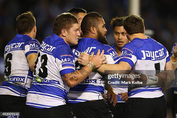 Frank Pritchard of the Bulldogs celebrates with his team mates after scoring a try during the round 20 NRL match between the Canterbury Bulldogs and...