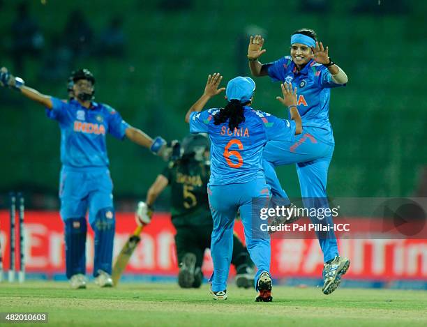 Sravanthi Naidu of India celebrates the wicket of Sana Mir captain of Pakistan during the ICC Women's World Twenty20 Playoff 2 match between Pakistan...