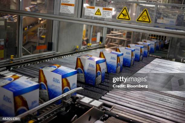 Packed bottles of Michelob Ultra beer move down a bottling line at the Anheuser-Busch Budweiser Brewery in St. Louis, Missouri, U.S., on Tuesday,...