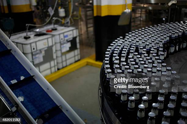 Bottles of Michelob Ultra beer move down a bottling line at the Anheuser-Busch Budweiser Brewery in St. Louis, Missouri, U.S., on Tuesday, April 1,...