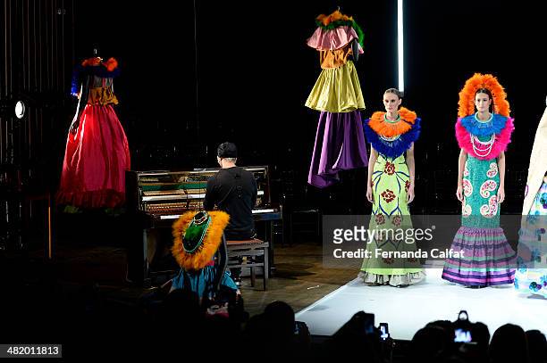 Fause Haten and Models walk the runway at FH por Fause Haten show during Sao Paulo Fashion Week Summer 2014/2015 at Parque Candido Portinari on April...