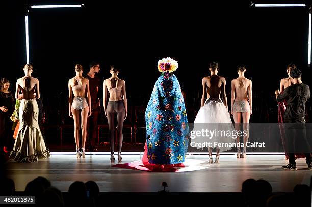 Models walk the runway at FH por Fause Haten show during Sao Paulo Fashion Week Summer 2014/2015 at Parque Candido Portinari on April 2, 2014 in Sao...