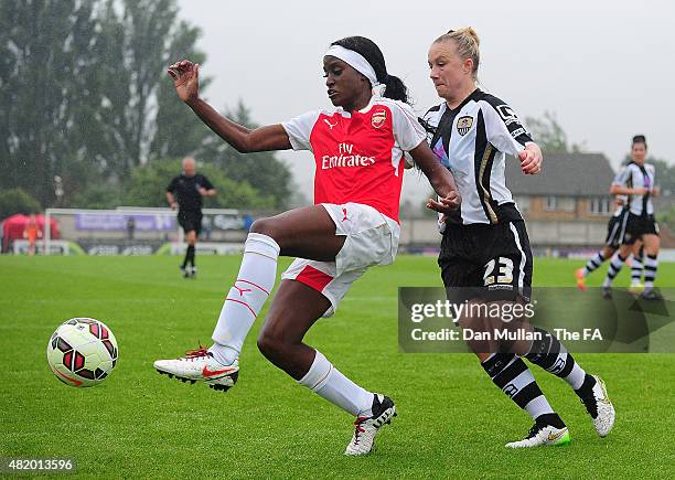 Chioma Ubogagu of Arsenal holds off Laura Bassett of Notts County during the WSL match between Arsenal Ladies and Notts County Ladies at Meadow Park...