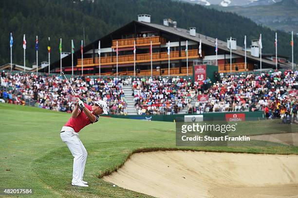 Danny Willett of England plays a shot on the 18th hole during the final round of the Omega European Masters at Crans-sur-Sierre Golf Club on July 26,...
