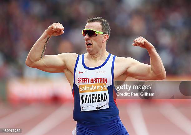 Richard Whitehead of Great Britain celebrates winning the Men's 200m T42 race during day three of the Sainsbury's Anniversary Games at The Stadium -...