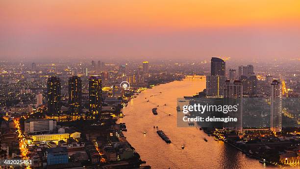 bangkok twilight skyline - river chao phraya stock pictures, royalty-free photos & images