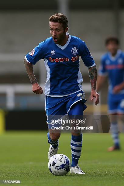Tom Kennedy of Rochdale in action during the pre season friendly match between Rochdale and Huddersfield Town at Spotland on July 18, 2015 in...