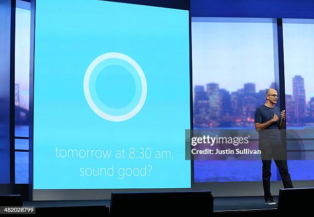 Microsoft CEO Satya Nadella demonstrates Cortana, a new digital personal assistant function for Windows phones, as he delivers a keynote address...