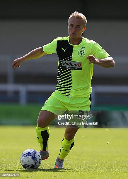 Kyle Dempsey of Huddersfield Town in action during the pre season friendly match between Rochdale and Huddersfield Town at Spotland on July 18, 2015...