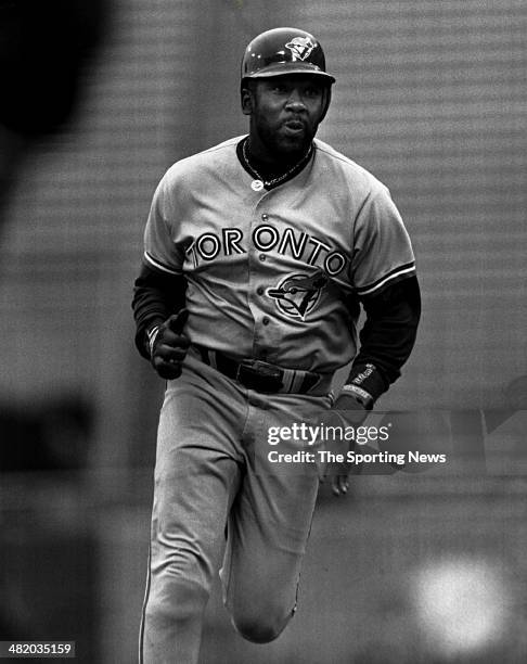 Joe Carter of the Toronto Blue Jays runs circa 1990s.