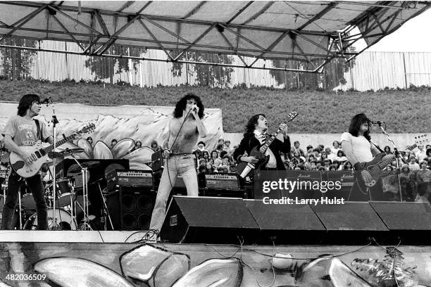 Malcolm Young, Bon Scott, Angus Young and Phil Rudd are performing with 'AC/DC' at the Oakland Coliseum in Oakland, California on August 21, 1979....