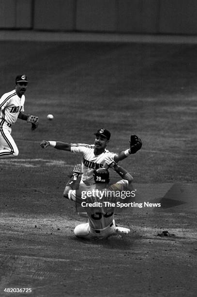 Carlos Baerga of the Cleveland Indians tries to catch the ball circa 1999.